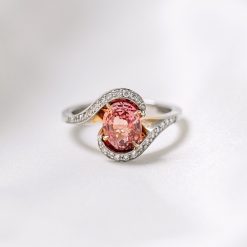 Padparadscha Sapphire and Diamond Twist Ring